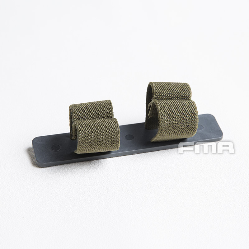 FMA MOLLE Strap Holder for CAT Tourniquet - Black/Coyote FMA MOLLE Strap Holder for CAT Tourniquet - Black/Coyote