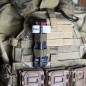 FMA MOLLE Strap Holder for CAT Tourniquet - Black/Coyote FMA MOLLE Strap Holder for CAT Tourniquet - Black/Coyote